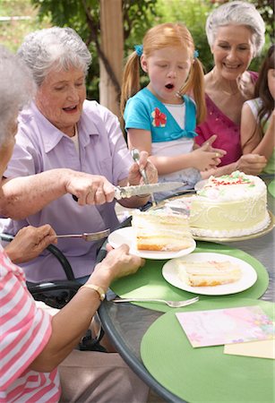 simsearch:600-01645179,k - Grandmothers and Granddaughters at Birthday Party Stock Photo - Premium Royalty-Free, Code: 600-01120292