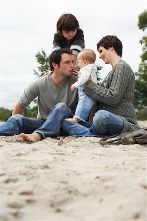 denim summer girl - Family at Beach Stock Photo - Premium Royalty-Free, Code: 600-01123700