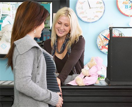 Pregnant Woman Shopping in Baby Store Stock Photo - Premium Royalty-Free, Code: 600-01164275