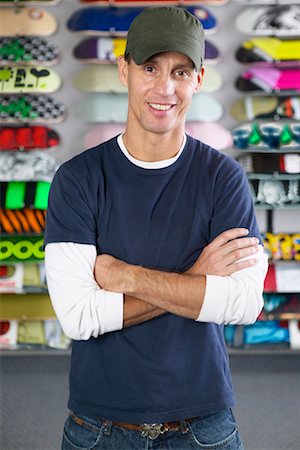 simsearch:700-01879918,k - Portrait of Skateboard Shop Owner Stock Photo - Premium Royalty-Free, Code: 600-01164271