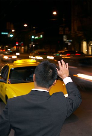 simsearch:700-00695782,k - Man Hailing Cab at Night Stock Photo - Premium Royalty-Free, Code: 600-01164427