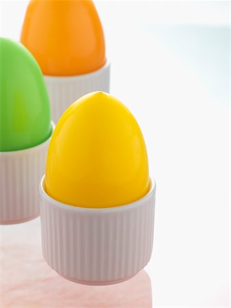 simsearch:700-01173313,k - Easter Eggs in White Eggcups Stock Photo - Premium Royalty-Free, Code: 600-01164728