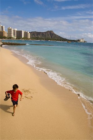 diamond head - Child Running on the Beach, Waikiki, Honolulu, Oahu, Hawaii, USA Stock Photo - Premium Royalty-Free, Code: 600-01163289