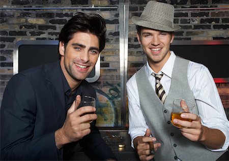 disco style man - Portrait of Men at a Bar Stock Photo - Premium Royalty-Free, Code: 600-01163425