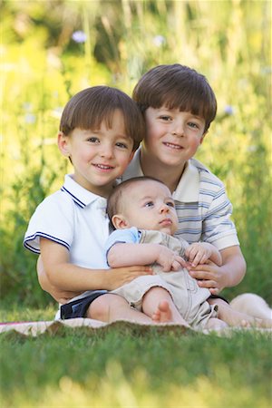 simsearch:700-01195953,k - Portrait of Three Brothers Outdoors Stock Photo - Premium Royalty-Free, Code: 600-01163559