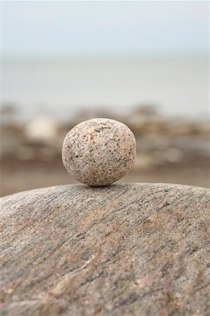 Round Stone on Rock Stock Photo - Premium Royalty-Free, Code: 600-01163776