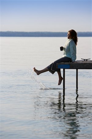 relax cottage lake - Woman Relaxing on Dock Stock Photo - Premium Royalty-Free, Code: 600-01172997