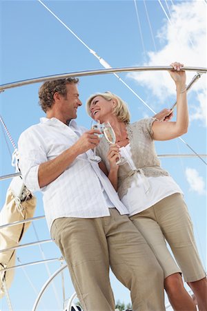 simsearch:600-00948527,k - Couple on Yacht at Marina Stock Photo - Premium Royalty-Free, Code: 600-01173405