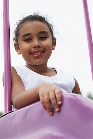 Girl on top of Slide Stock Photo - Premium Royalty-Free, Code: 600-01173632