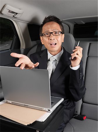 simsearch:700-03058969,k - Businessman in Car Stock Photo - Premium Royalty-Free, Code: 600-01173864