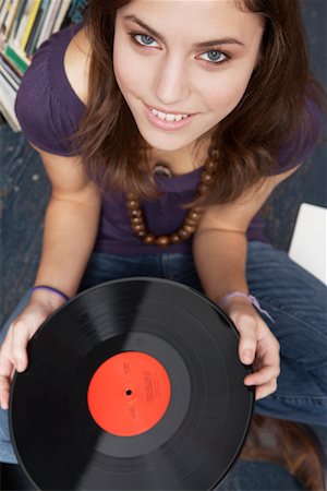 Young Woman Holding Record Stock Photo - Premium Royalty-Free, Code: 600-01184590