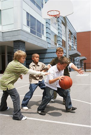 Boys Playing Basketball Stock Photo - Premium Royalty-Free, Code: 600-01184644