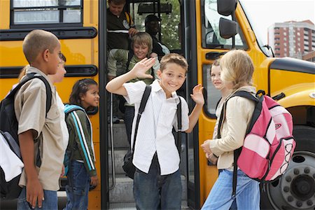 excited kids on first day of school - Children Boarding School Bus Stock Photo - Premium Royalty-Free, Code: 600-01184665