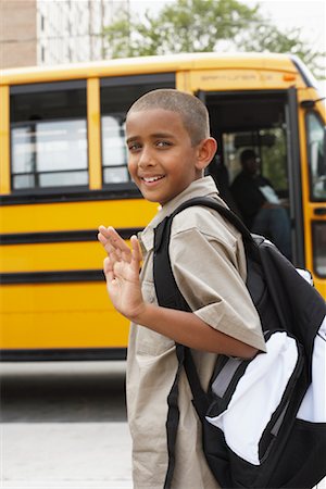 Boy Leaving on School Bus Stock Photo - Premium Royalty-Free, Code: 600-01184678