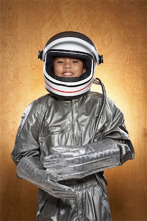 silver astronaut images - Portrait of Girl Dressed as Astronaut Stock Photo - Premium Royalty-Free, Code: 600-01183026