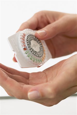 Woman Taking Birth Control Stock Photo - Premium Royalty-Free, Code: 600-01183039