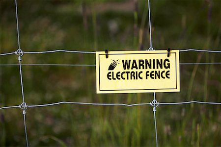 Electric Fence Warning Stock Photo - Premium Royalty-Free, Code: 600-01183513