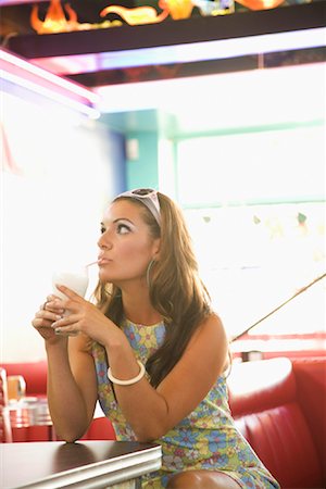 Woman Sitting in Diner Stock Photo - Premium Royalty-Free, Code: 600-01195465