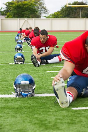 simsearch:700-00048630,k - Football Players Stretching Stock Photo - Premium Royalty-Free, Code: 600-01196497