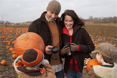 Family in Pumpkin Patch Stock Photo - Premium Royalty-Free, Code: 600-01196606
