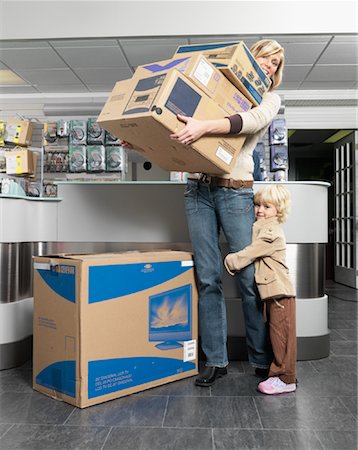 simsearch:600-01275545,k - Mother and Daughter Purchasing Electronics Equipment Stock Photo - Premium Royalty-Free, Code: 600-01198749