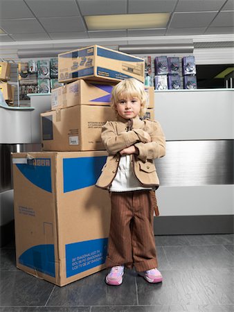 simsearch:600-01275545,k - Girl Standing by Boxes in Store Stock Photo - Premium Royalty-Free, Code: 600-01198751