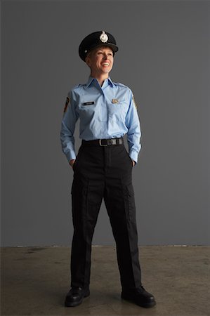 female police officer happy - Portrait de l'officier de Police Photographie de stock - Premium Libres de Droits, Code: 600-01199093