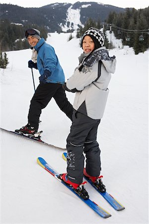 simsearch:600-01224168,k - Man and Boy on Ski Hill, Whistler, British Columbia, Canada Stock Photo - Premium Royalty-Free, Code: 600-01224118
