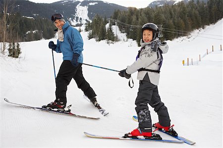 simsearch:600-01224168,k - Man and Boy on Ski Hill, Whistler, British Columbia, Canada Stock Photo - Premium Royalty-Free, Code: 600-01224119