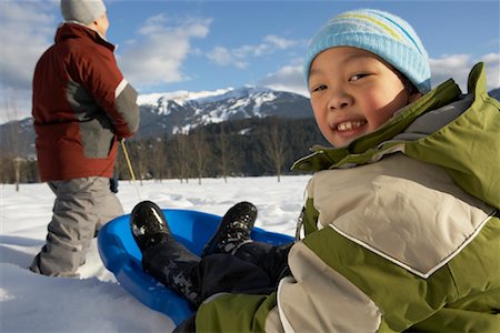 simsearch:600-01224168,k - Father and Son Sledding, Whistler, British Columbia, Canada Stock Photo - Premium Royalty-Free, Code: 600-01224158