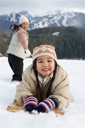 simsearch:600-01224168,k - Woman Pulling Daughter on Toboggan, Whistler, British Columbia, Canada Stock Photo - Premium Royalty-Free, Code: 600-01224163