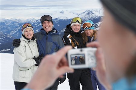simsearch:600-01540982,k - Person Taking Picture of Friends On Ski Hill, Whistler, BC, Canada Stock Photo - Premium Royalty-Free, Code: 600-01224199
