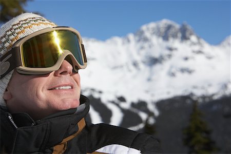simsearch:600-01540982,k - Close-up of Man Wearing Ski Goggles, Whistler, BC, Canada Stock Photo - Premium Royalty-Free, Code: 600-01224223
