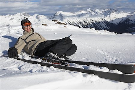 simsearch:600-01540982,k - Man Laughing After Falling while Skiing, Whistler, BC, Canada Stock Photo - Premium Royalty-Free, Code: 600-01224260