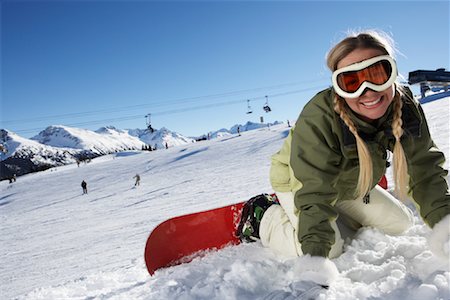 pictures of female athletes bending over - Woman Fallen Down from Snowboard Stock Photo - Premium Royalty-Free, Code: 600-01235279