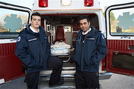 simsearch:700-00090429,k - Paramedics Standing in Front of Ambulance Stock Photo - Premium Royalty-Free, Code: 600-01235366