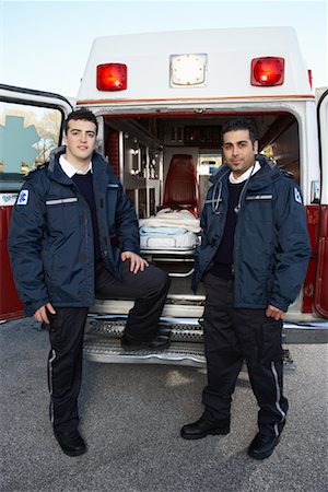 simsearch:700-00090429,k - Paramedics Standing in Front of Ambulance Stock Photo - Premium Royalty-Free, Code: 600-01235367