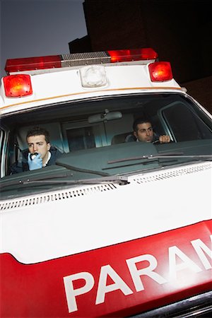 simsearch:700-00090429,k - Paramedics Inside Ambulance Stock Photo - Premium Royalty-Free, Code: 600-01235379