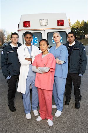 simsearch:600-01235402,k - Medical Personnel Standing in Front of Ambulance Stock Photo - Premium Royalty-Free, Code: 600-01235391