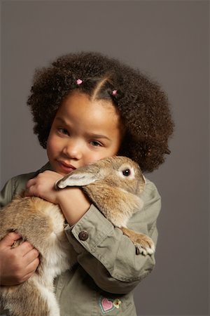 simsearch:700-01236595,k - Portrait of Girl Holding Rabbit Stock Photo - Premium Royalty-Free, Code: 600-01236604