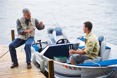 Man and Teenager Fishing, Belgrade Lakes, Maine, USA Stock Photo - Premium Royalty-Free, Code: 600-01236630