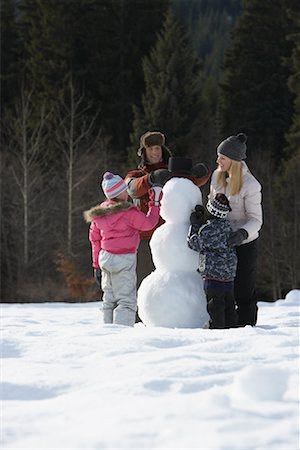 simsearch:600-01224168,k - Family Making Snowman Stock Photo - Premium Royalty-Free, Code: 600-01248338