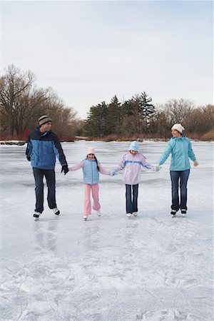 Family Skating Stock Photo - Premium Royalty-Free, Code: 600-01249387