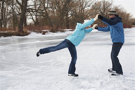 Couple Skating Stock Photo - Premium Royalty-Free, Code: 600-01249392