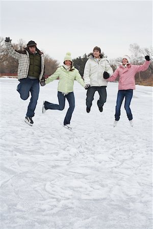 simsearch:600-01072271,k - Skaters Jumping in the Air Stock Photo - Premium Royalty-Free, Code: 600-01249414