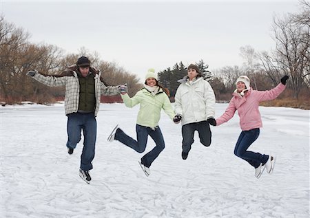 simsearch:600-01072271,k - Skaters Jumping in the Air Stock Photo - Premium Royalty-Free, Code: 600-01249413