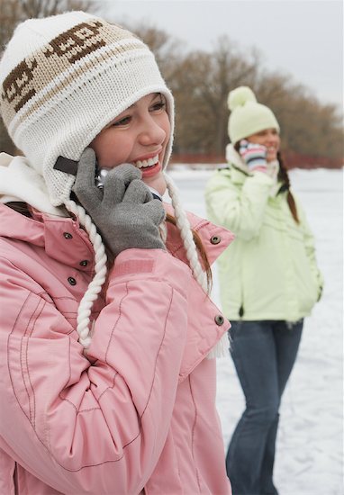 Women Talking on Cell Phones Stock Photo - Royalty-Free, Artist: Masterfile,