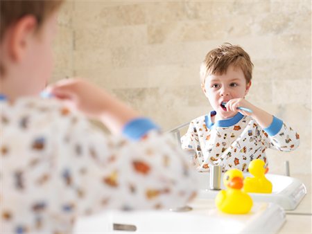 Little Boy Brushing Teeth Stock Photo - Premium Royalty-Free, Code: 600-01260388