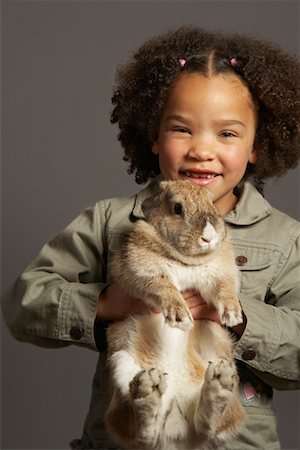 simsearch:700-01236595,k - Girl Holding Rabbit Stock Photo - Premium Royalty-Free, Code: 600-01275387
