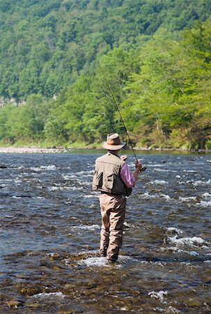 Man Fly Fishing, Beaverkill River, Catskill Park, New York, USA Stock Photo - Premium Royalty-Free, Code: 600-01345196